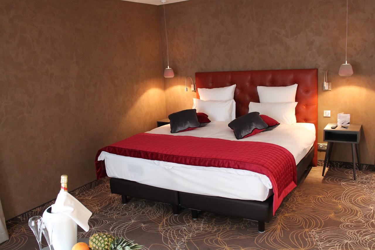 Hotel Restaurant L'Orchidee Ensisheim Bagian luar foto